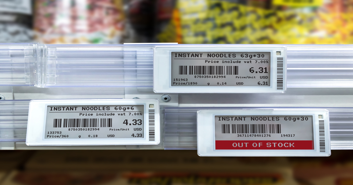 A supermarket aisle up-close with digital product labels featuring product name, price, and a bar code.